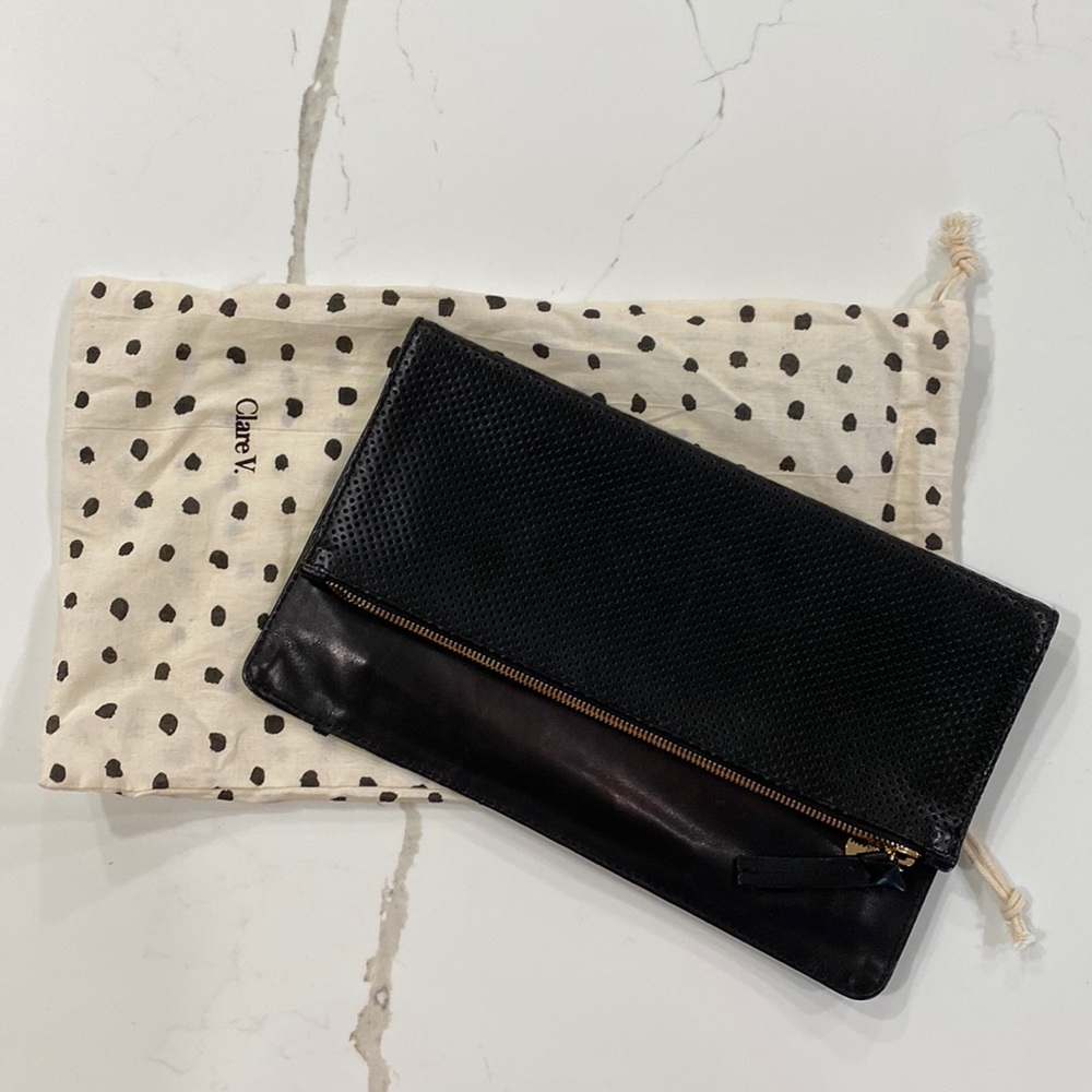 Clare V foldover perforated clutch